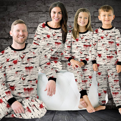 Close-up lifestyle view of the family matching Halloween mummy pajama set