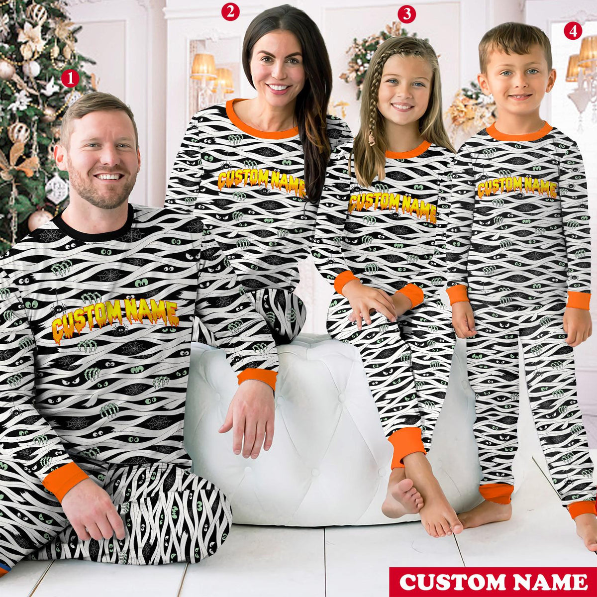 Lifestyle view of a family wearing the matching halloween mummy pajama sets