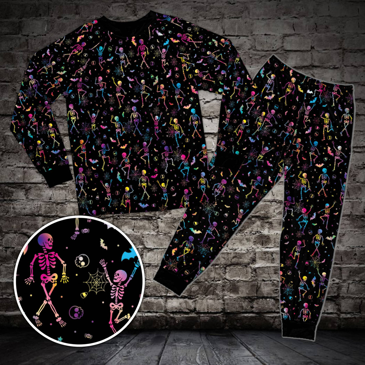 Front view of the black Halloween neon pajama set featuring skeletons and bats