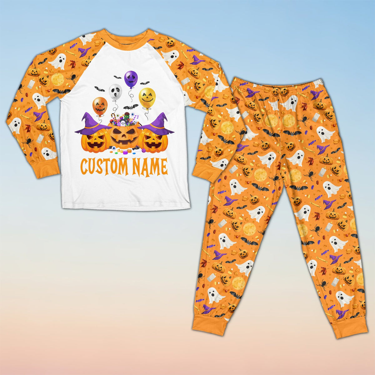 Matching family Halloween pajama set with custom name and jack-o'-lantern design, main view
