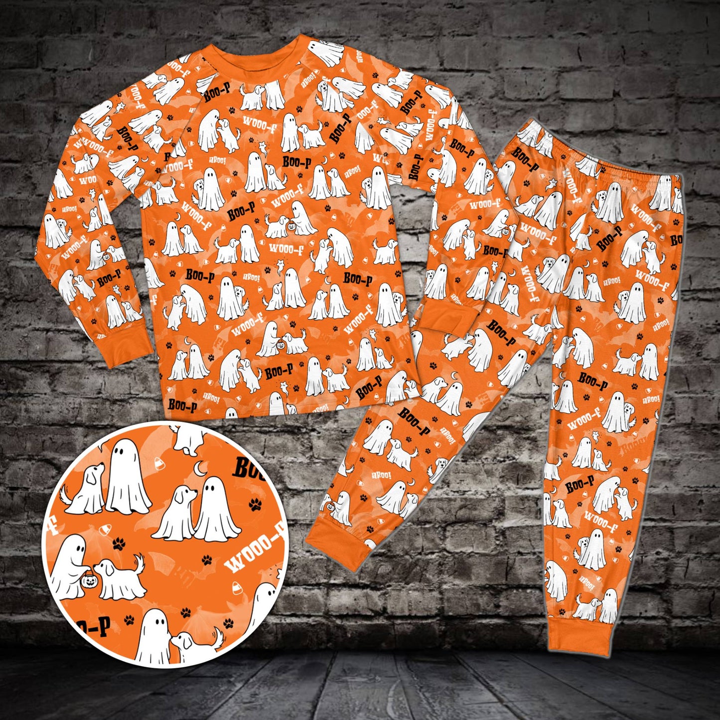 Orange matching family pajama set featuring a dog ghost Halloween pattern, front view