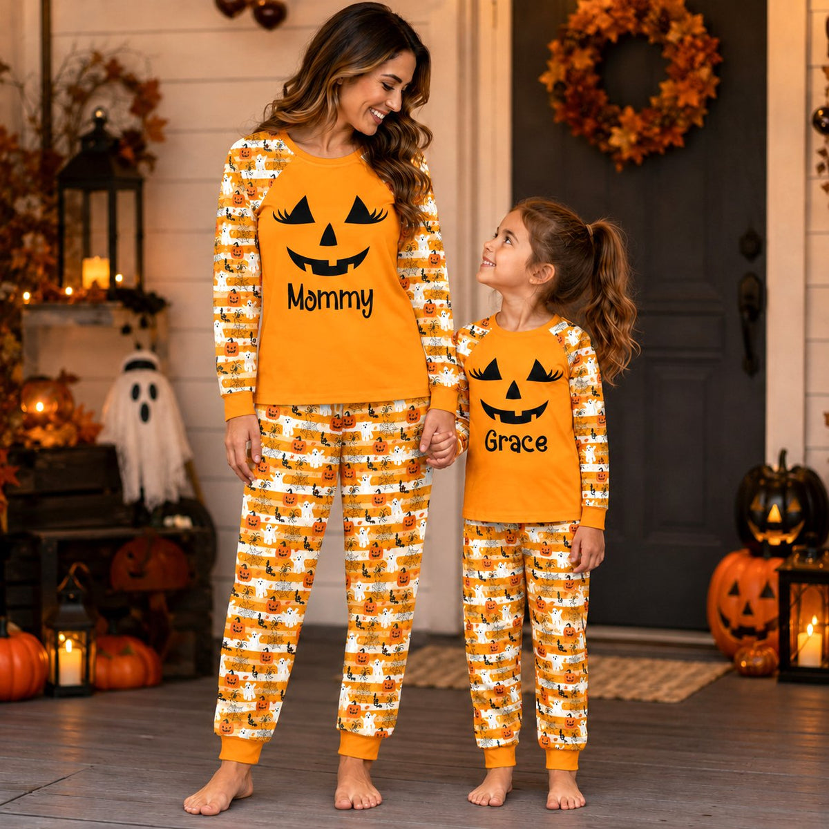 Lifestyle view of a family wearing the matching halloween pajama set