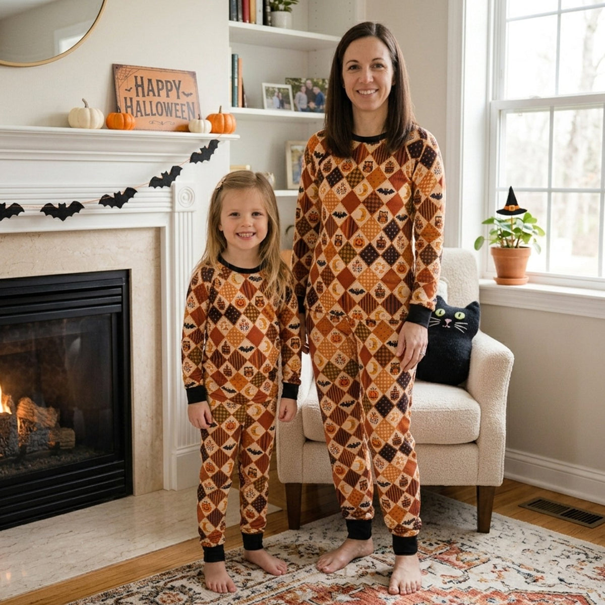 Lifestyle view of a family enjoying their matching Halloween pajamas