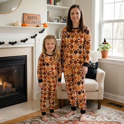 Lifestyle view of a family enjoying their matching Halloween pajamas