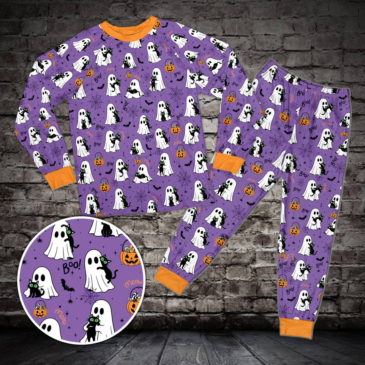 Halloween pajama set in purple featuring bats and spiderwebs, front view