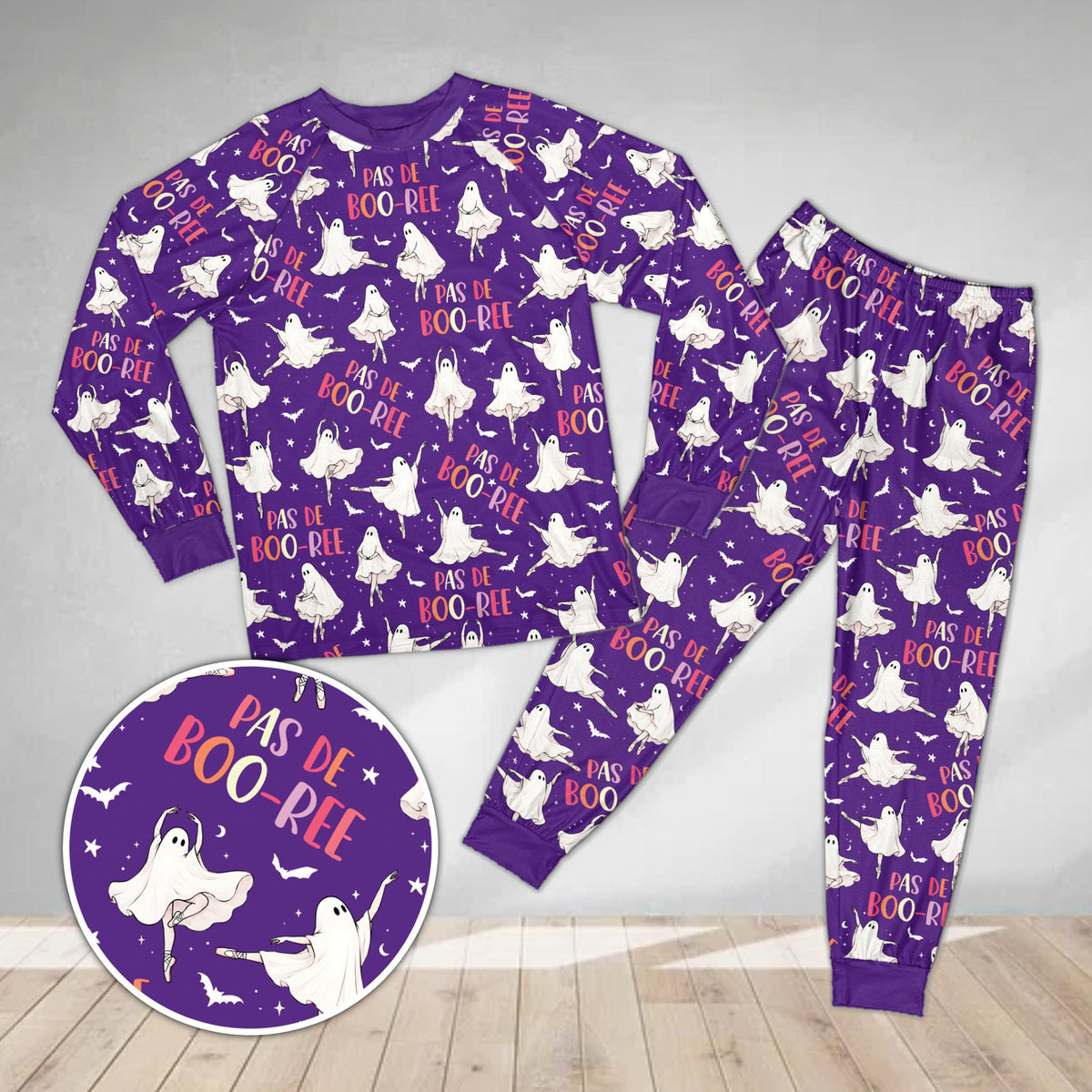 Purple matching holiday pajamas for the family with ghost design, front view