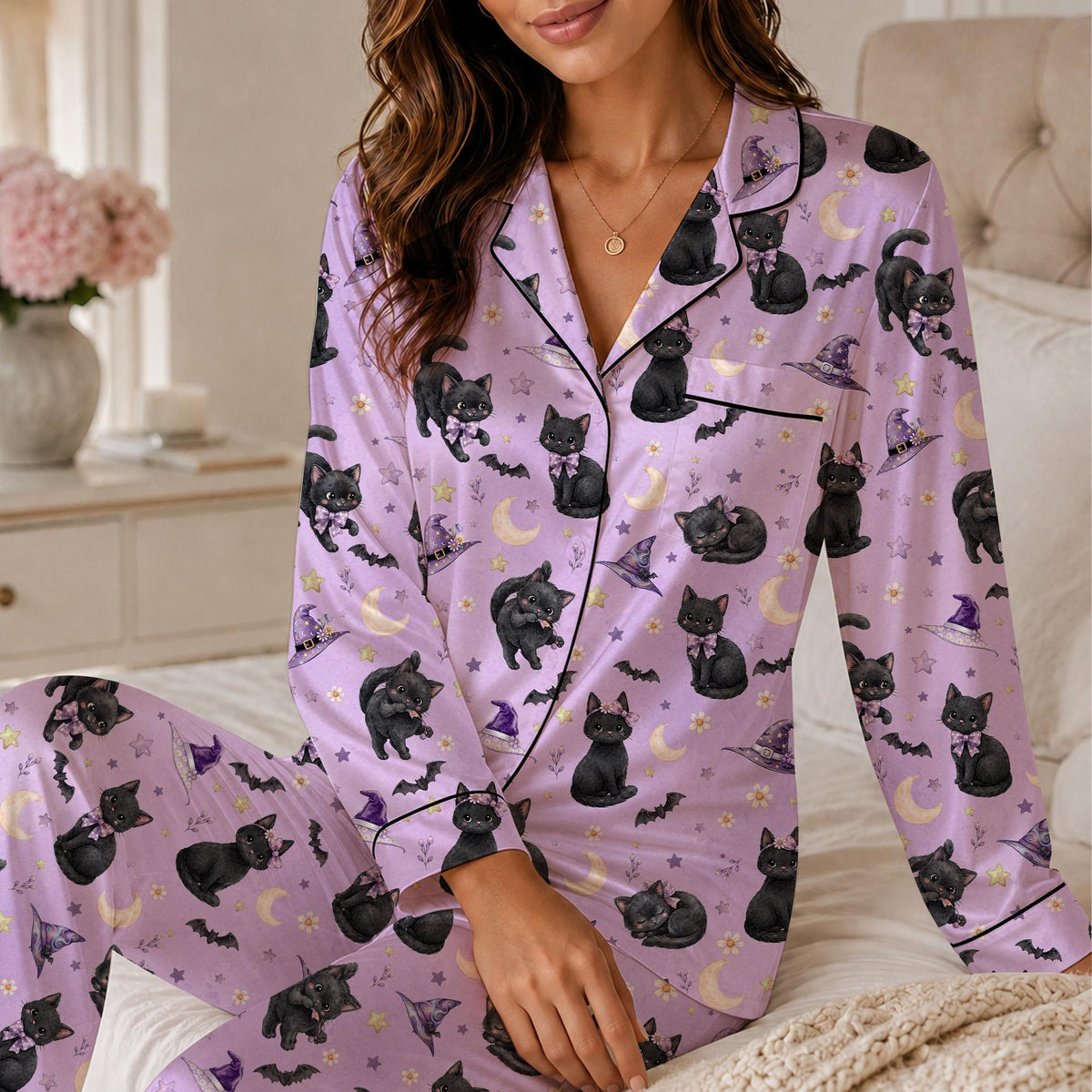 Lifestyle view of a family wearing the matching Halloween pajama sets