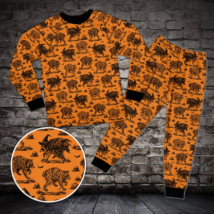 Orange Halloween raccoon pajama set featuring bats and skulls, front view