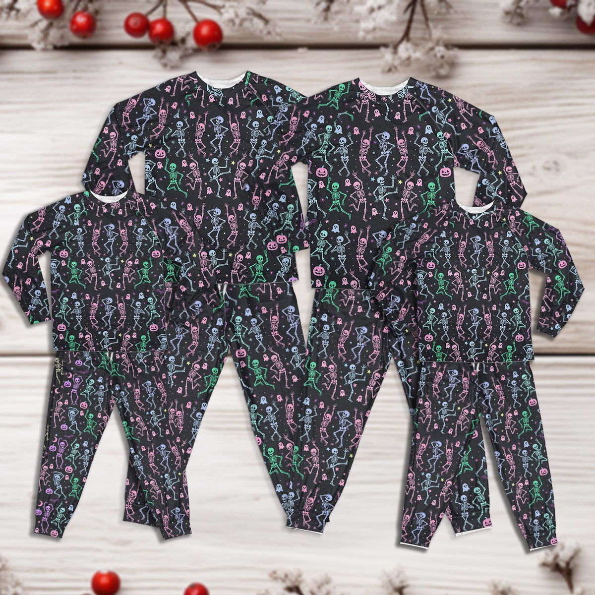 Child pajama set with Halloween skeletons and ghosts print on black background