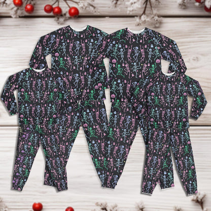 Child pajama set with Halloween skeletons and ghosts print on black background