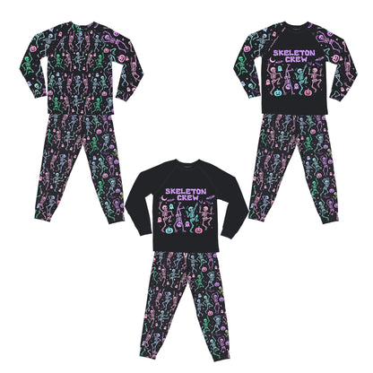 Adult pajama pants with colorful dancing skeletons, ghosts, pumpkins, and bats print