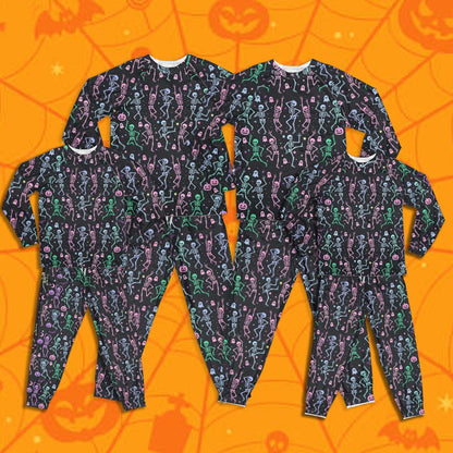 Another view of the child pajama set featuring the Halloween skeletons and ghosts design
