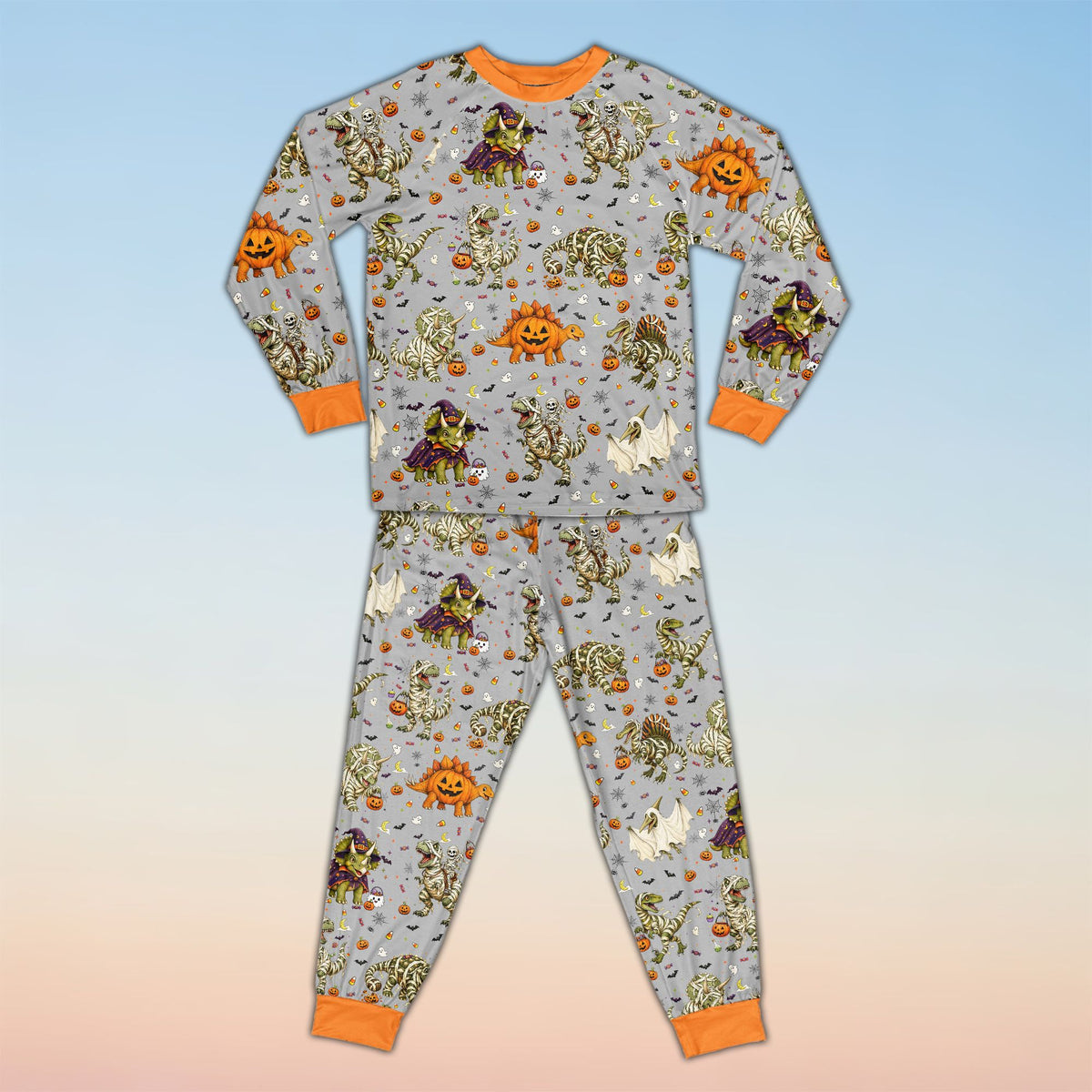 Close up view of the personalized Halloween dinosaur matching family pajama pattern