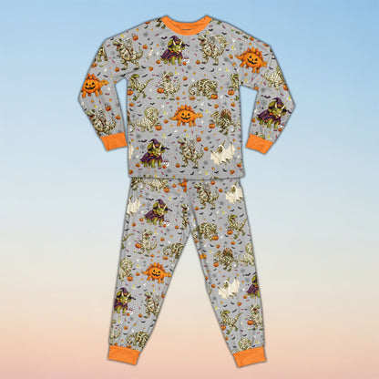 Close up view of the personalized Halloween dinosaur matching family pajama pattern