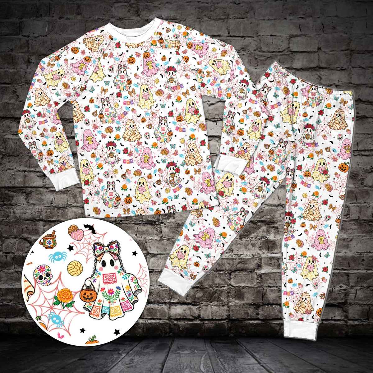 Matching family pajama set featuring Halloween ghosts and sugar skulls on white, front view