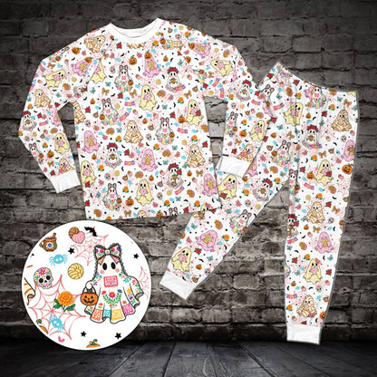 Matching family pajama set featuring Halloween ghosts and sugar skulls on white, front view