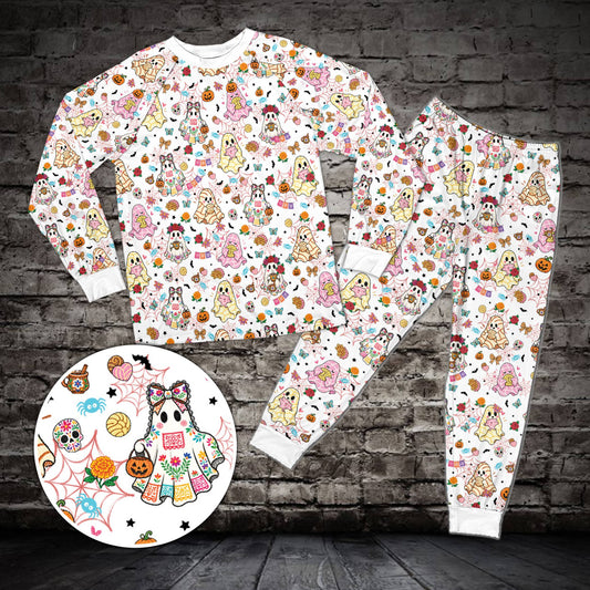 Matching family pajama set featuring Halloween ghosts and sugar skulls on white, front view
