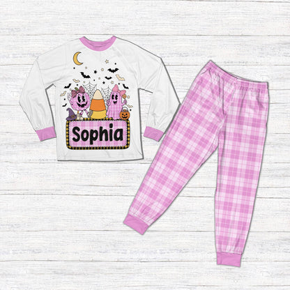 Main view of the family matching halloween pajamas featuring a retro pumpkin design