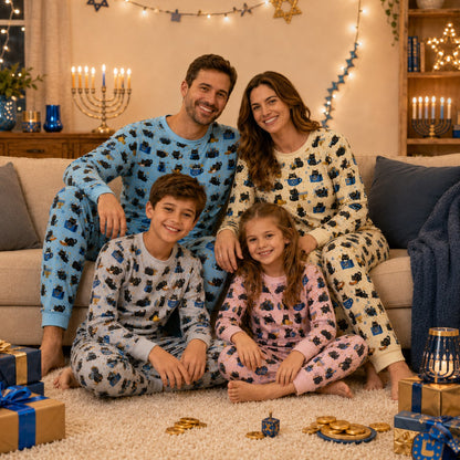 Close up of people wearing matching holiday pajamas family