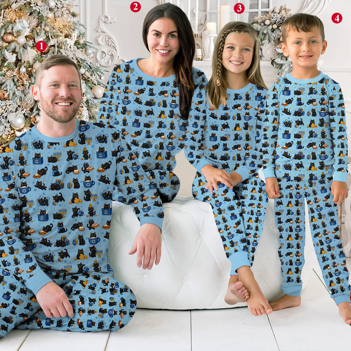 Close up of the cat and dreidel pattern on the pajama top