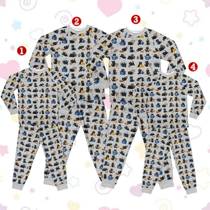 Family wearing the Hanukkah family pajama set with cat and menorah pattern