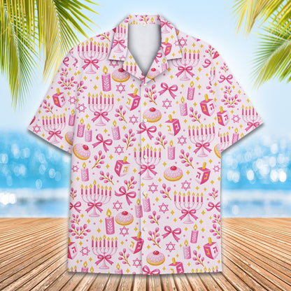 Main view of the pink hanukkah pajama set featuring menorahs, dreidels, and Stars of David