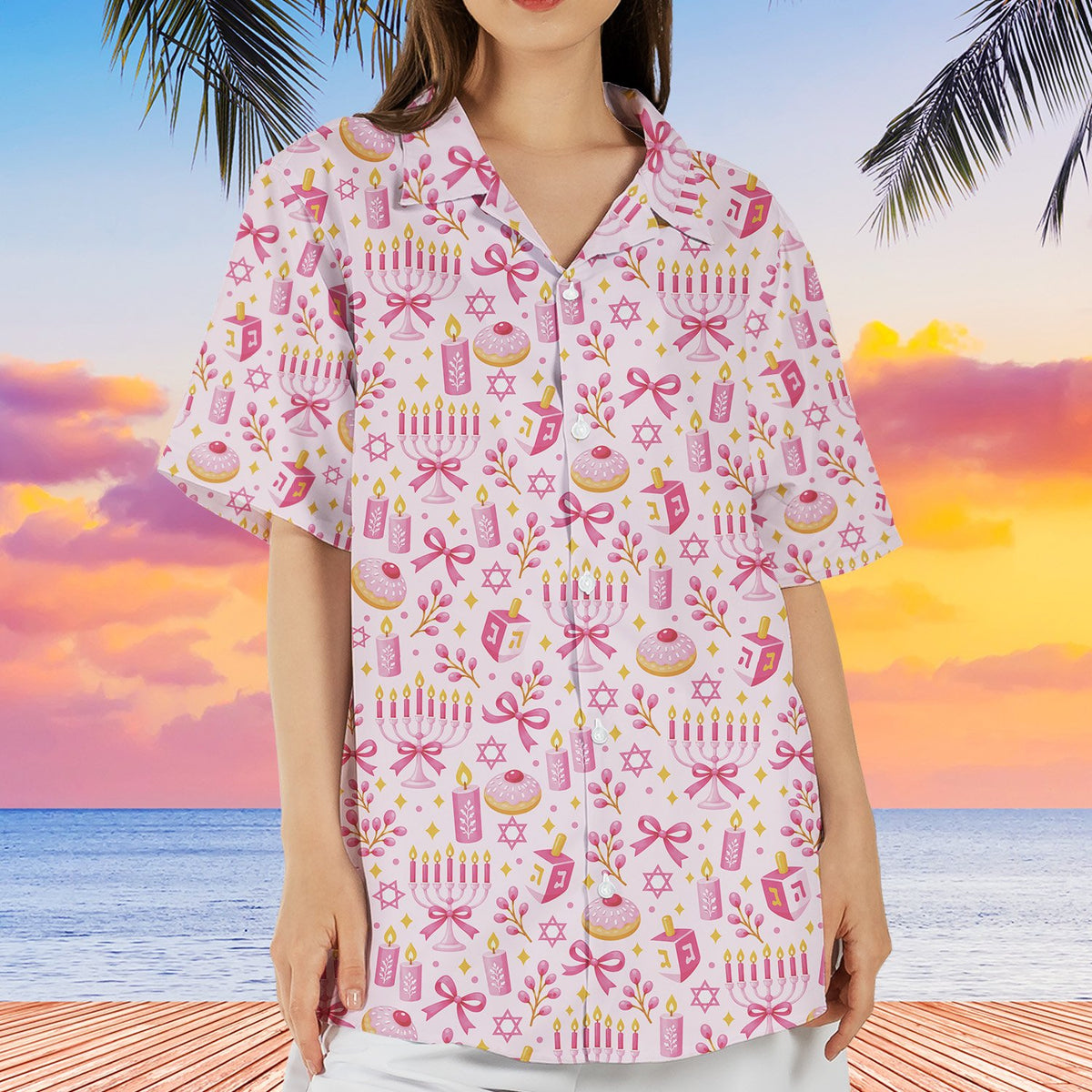 Lifestyle image of someone wearing the pink hanukkah pajama set while relaxing