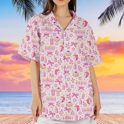 Lifestyle image of someone wearing the pink hanukkah pajama set while relaxing