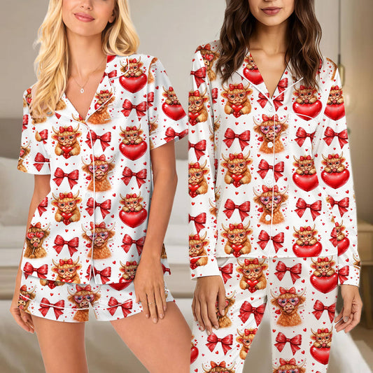 Main view of the highland cow pajama set featuring cows with heart glasses