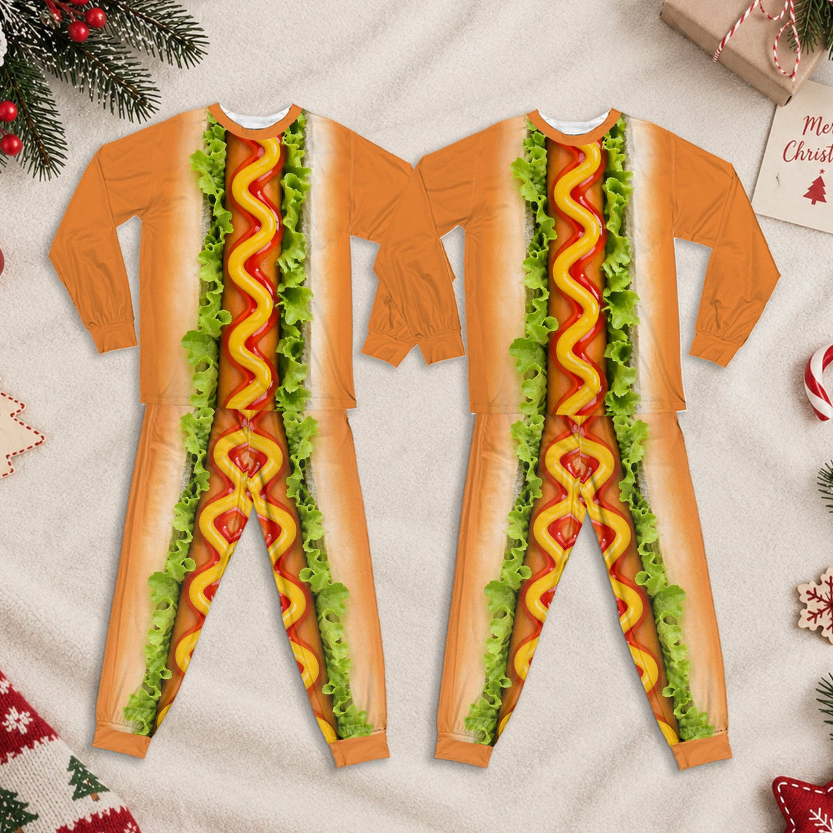 Another lifestyle view of the hot dog family pajama set with orange, red, and green details.