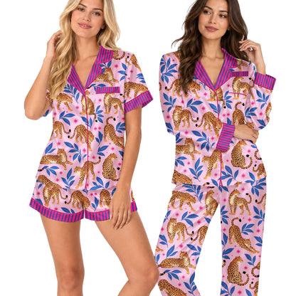 Family wearing matching leopard tropical pajama set, lifestyle view