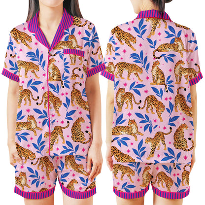 Matching family pajamas with leopard tropical pattern, front view