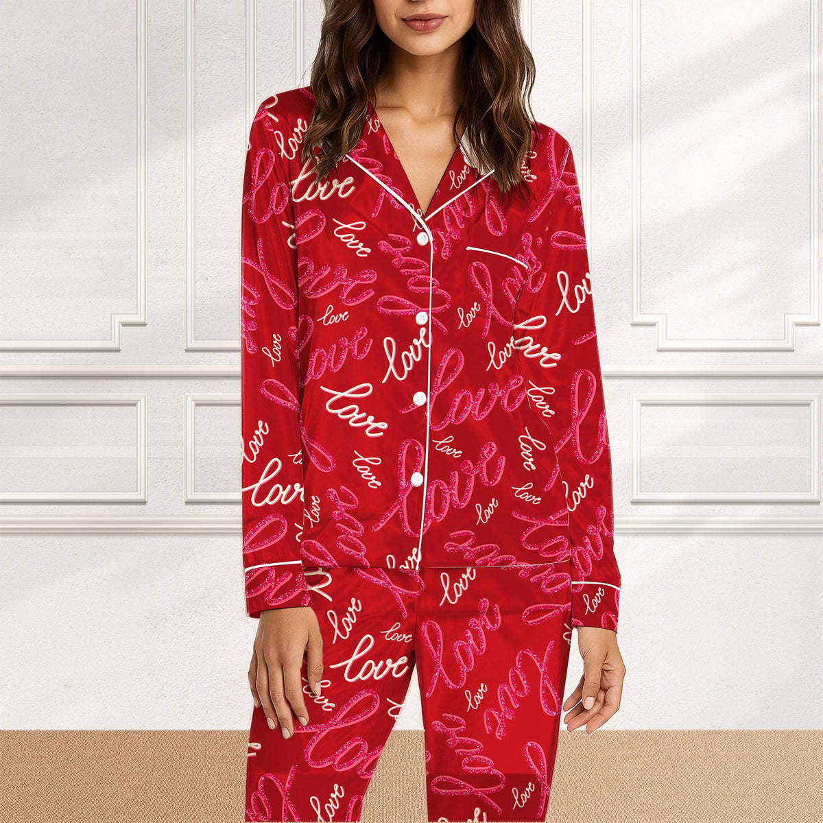 Matching family pajamas in red with all-over love script pattern, front view of the pajama set