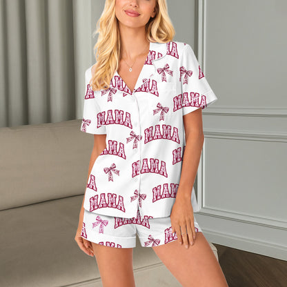 Front view of the white mama pajama set featuring floral print letters and decorative bows