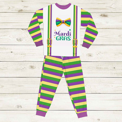 Front view of the white top and striped pants of the mardi gras pajama set.