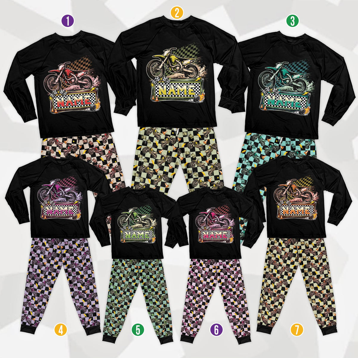 Front view of the motocross pajama set with black raglan shirt, dirt bike illustration, and checkered sleeves and pants
