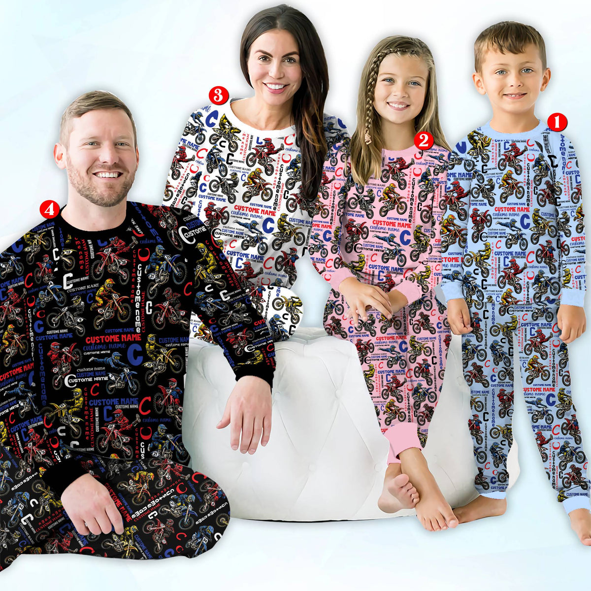Family wearing matching motocross racing pajama sets in multicolor lifestyle view