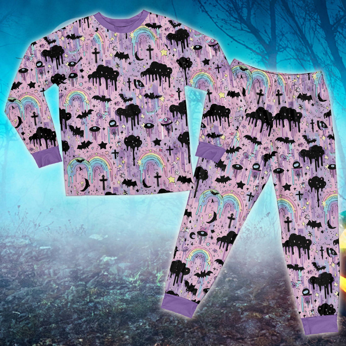 Front close-up of the pastel goth Halloween matching family pajamas showing vibrant prints