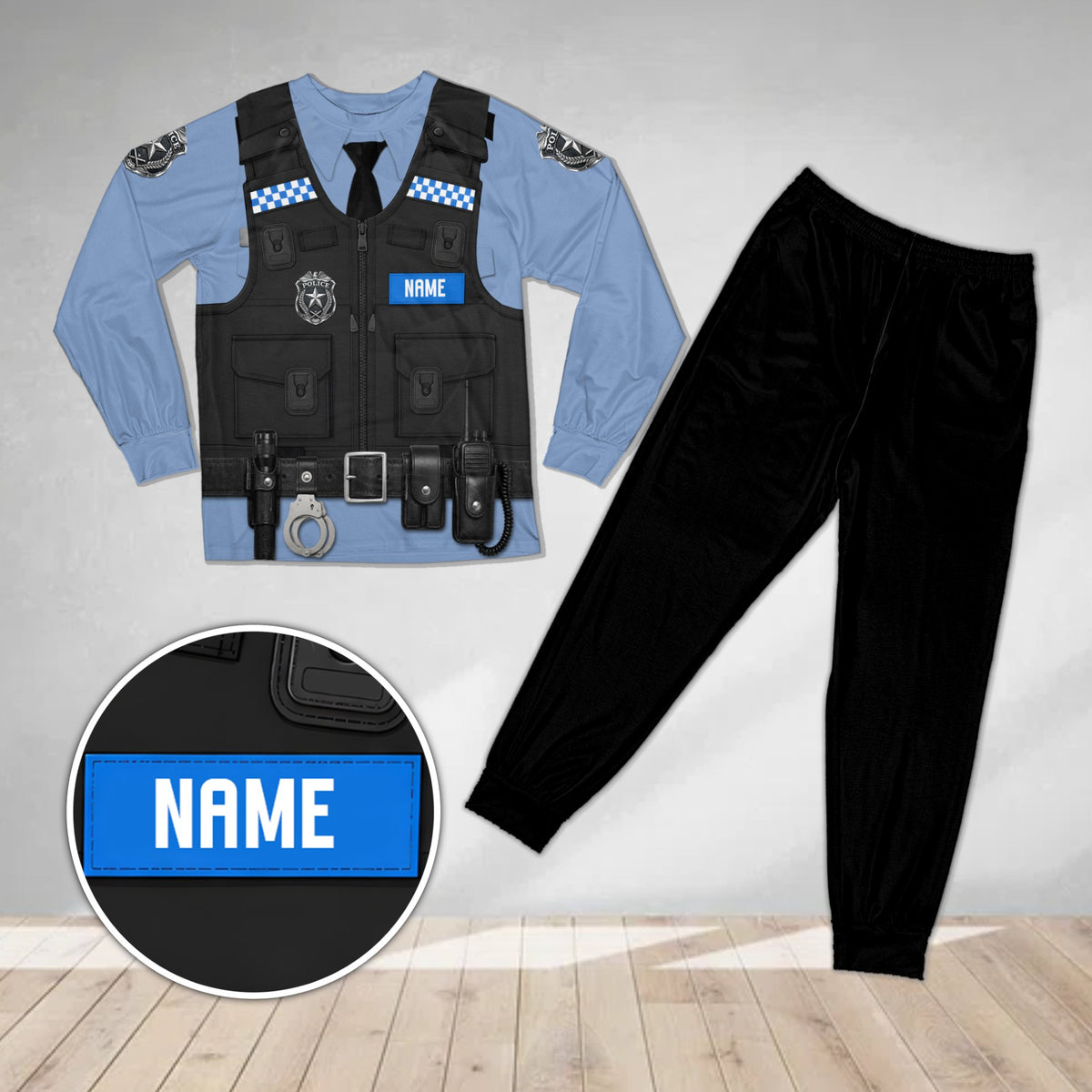 Close-up front view of the light blue police pajama set with tactical vest print