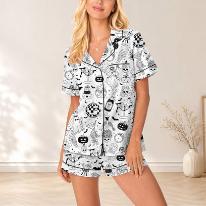 Detailed view of the spooky elements on the white polyester pajama set