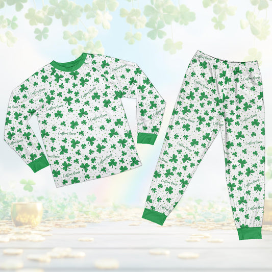 Personalized St. Patrick's Day pajama set with custom name and number, featuring shamrocks and bows, matching family pajamas on a white background.