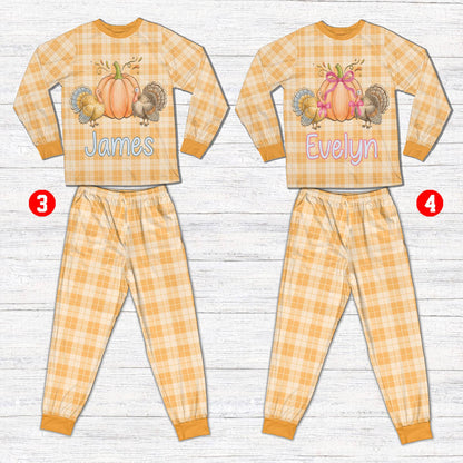 Detail view of the matching family pajama set showing the plaid pattern and personalized design