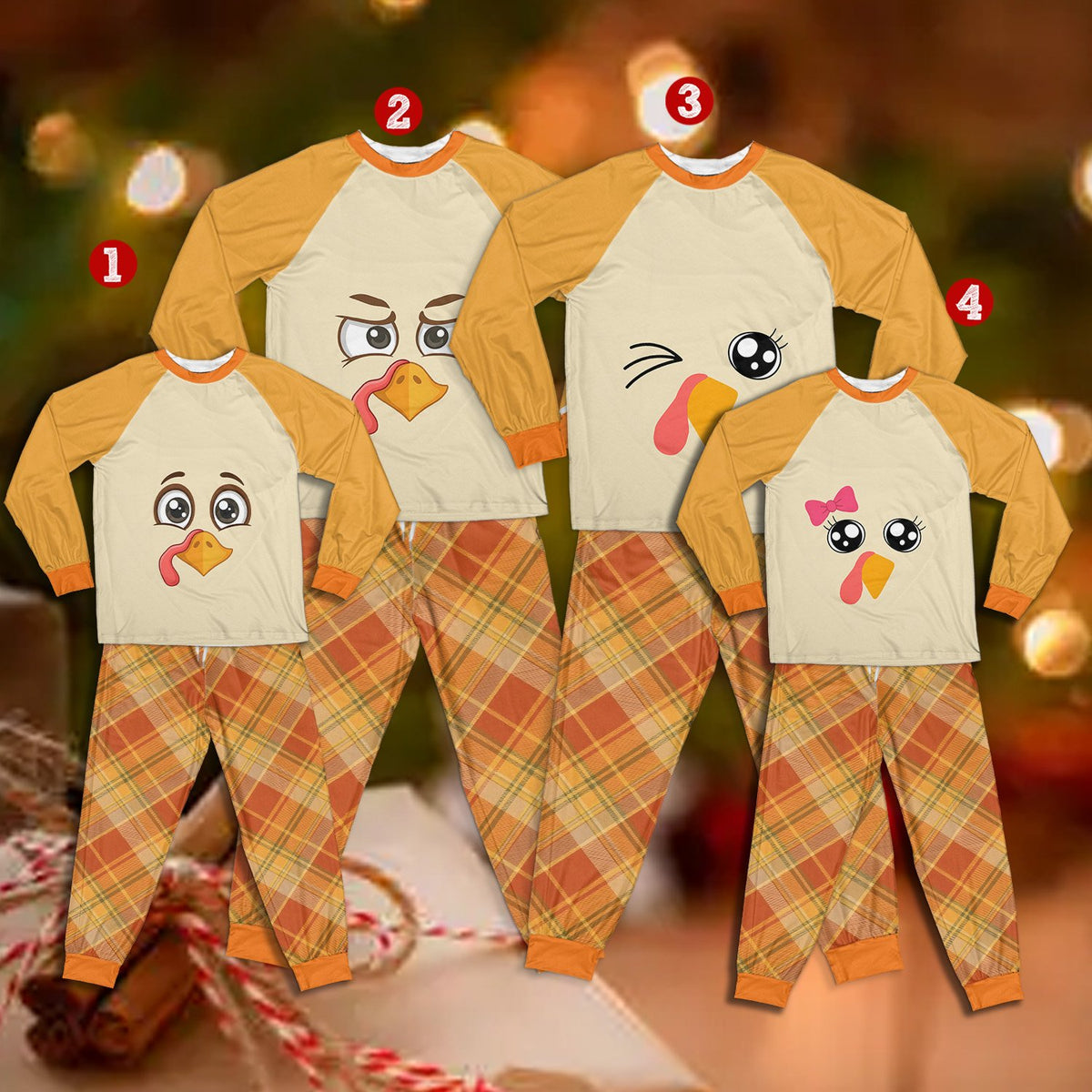 Front view of a baby-sized Thanksgiving pajama set with turkey face print