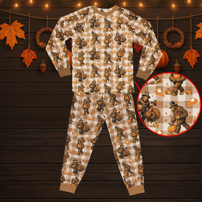 Plaid matching family pajamas with Thanksgiving Bigfoot and turkey design, front view