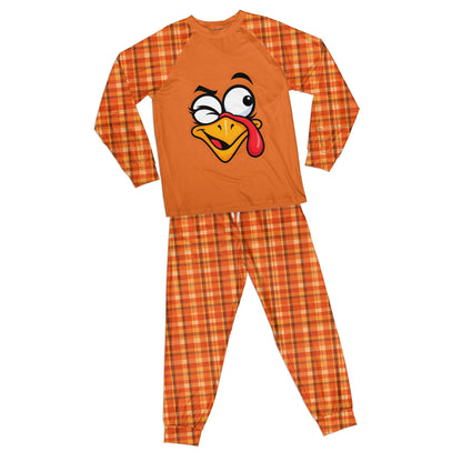 Thanksgiving pajama set in orange with cartoon turkey and plaid pattern, front view
