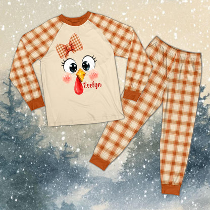 Thanksgiving turkey matching family pajama set with plaid pants, lifestyle view