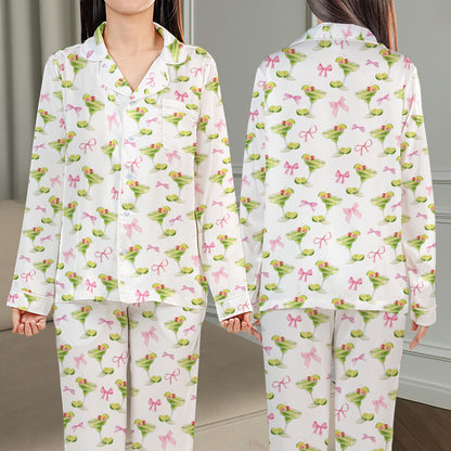 Tropical drinks pajama set featuring green margaritas and pink bows on a white background, main front view