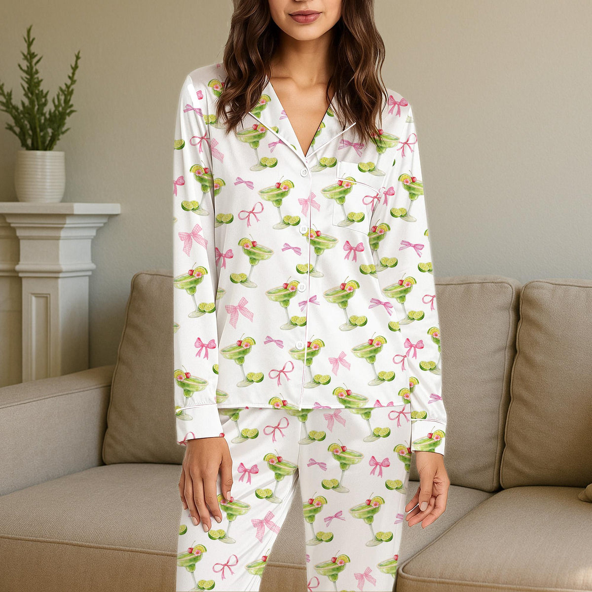 Lifestyle image of someone wearing the matching family pajamas with tropical drinks print