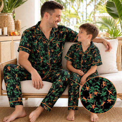 Detail view of tropical jungle monkey sleepwear set showing green leaf pattern