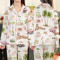 Front view of matching pajamas for family with getaway theme